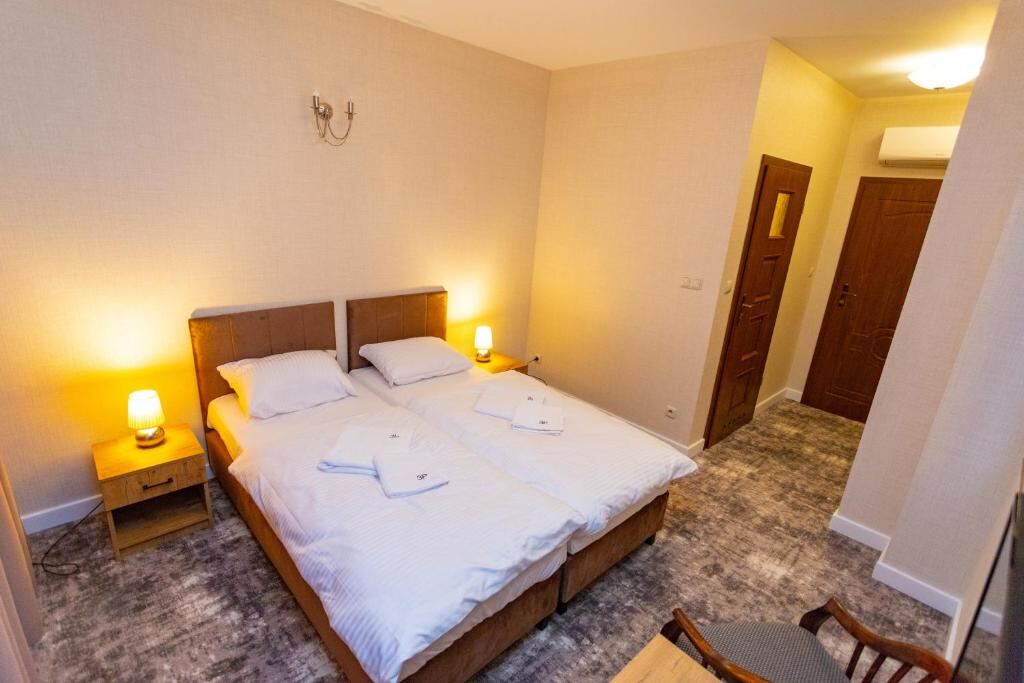 Pokój czteroosobowy - 37 m² at Hotel Trzy Podkowy